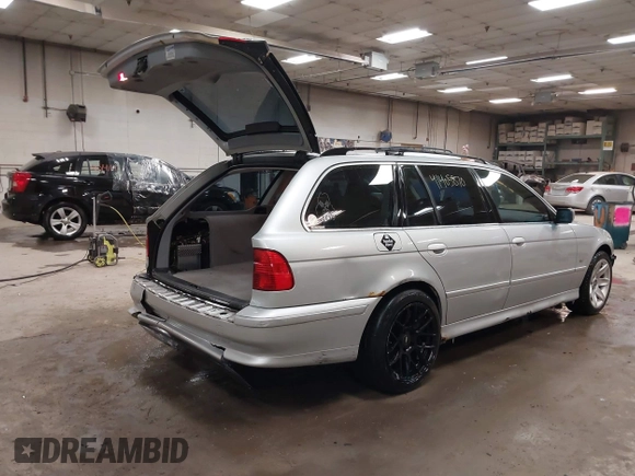 2003 BMW 5 Series 525iT with VIN WBADS33413GD50535, listed as a IAAI auction lot 41405870 with 180,748 mi miles. Bid and sale history available at carsss.com. Image 4.