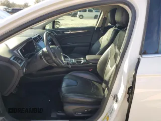 2013 Ford Fusion Titanium Hybrid with VIN 3FA6P0RU2DR277773, listed as a Copart auction lot 85990424 with 215,289 mi miles and Non Repairable. Bid and sale history available at DreamBid. Image 7.