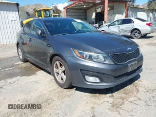 2015 Kia Optima LX z VIN KNAGM4A79F5622157, wystawiony jako IAAI lot #41744406 z przebiegiem 145 284 mil mil oraz . Historia ofert i sprzedaży dostępna na DreamBid. Obrazek 1.
