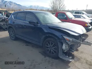 2017 Mazda CX-5 Grand Touring with VIN JM3KFBDL3H0149397, listed as a IAAI auction lot 41085425 with 161,675 mi miles. Bid and sale history available at carsss.com. Image 1.