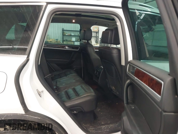 2013 Volkswagen Touareg Lux with VIN WVGEF9BP5DD011511, listed as a IAAI auction lot 41608840 with 167,350 mi miles and . Bid and sale history available at DreamBid. Image 8.