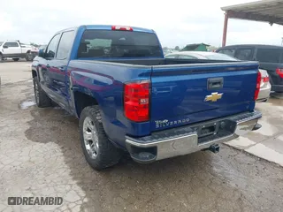 2015 Chevrolet Silverado 1500 LT with VIN 3GCPCREC2FG211914, listed as a IAAI auction lot 42025619 with 141,732 mi miles. Bid and sale history available at carsss.com. Image 3.