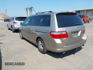 2005 Honda Odyssey EX-L with VIN 5FNRL38755B107829, listed as a IAAI auction lot 42422225 with 227,008 mi miles and . Bid and sale history available at DreamBid. Image 3.