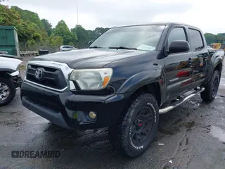 2014 Toyota Tacoma with VIN 5TFLU4EN5EX101434, listed as a IAAI auction lot 42273927 with 216,394 mi miles and . Bid and sale history available at DreamBid. Image 17.