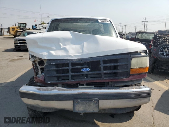 1992 Ford F-150 with VIN 1FTEF14HXNPA24587, listed as a Copart auction lot 70803324 with 0 mi miles and Salvage Title. Bid and sale history available at carsss.com. Image 5.