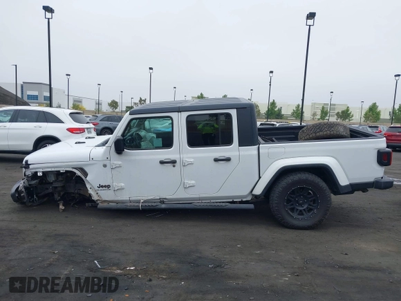 2020 Jeep Gladiator Sport S with VIN 1C6HJTAG9LL194454, listed as a IAAI auction lot 42430339 with 90,461 mi miles and . Bid and sale history available at DreamBid. Image 15.