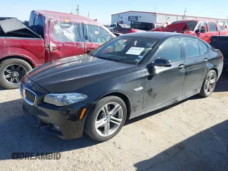 2016 BMW 5 Series 528i xDrive with VIN WBA5A7C56GG145318, listed as a IAAI auction lot 41414556 with 122,879 mi miles. Bid and sale history available at carsss.com. Image 2.