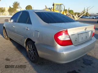 2004 Toyota Camry LE with VIN 4T1BE32K34U307084, listed as a IAAI auction lot 41960265 with 249,222 mi miles. Bid and sale history available at carsss.com. Image 3.