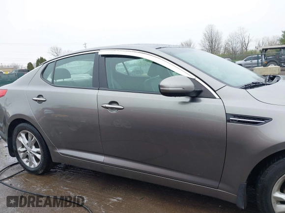 2013 Kia Optima EX z VIN 5XXGN4A72DG166687, wystawiony jako IAAI lot #41967631 z przebiegiem 202 712 mil mil oraz . Historia ofert i sprzedaży dostępna na DreamBid. Obrazek 14.