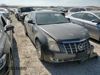 2012 Cadillac CTS Premium z VIN 1G6DS5E35C0128558, wystawiony jako Copart lot #65431155 z przebiegiem 186 593 mil mil oraz Szkoda całkowita • Salvage title. Historia ofert i sprzedaży dostępna na DreamBid. Obrazek 13.