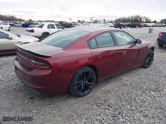 2017 Dodge Charger SE with VIN 2C3CDXBGXHH612156, listed as a IAAI auction lot 41028308 with 123,438 mi miles. Bid and sale history available at carsss.com. Image 4.