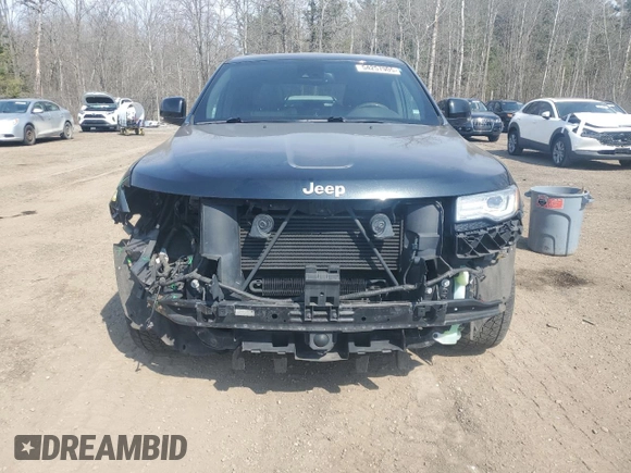 2015 Jeep Grand Cherokee Summit with VIN 1C4RJFJM3FC694733, listed as a Copart auction lot 54257905 with 123,981 mi miles and Clean title. Bid and sale history available at DreamBid. Image 5.