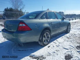 2006 Ford Five Hundred SE with VIN 1FAFP23146G119696, listed as a IAAI auction lot 41599381 with 184,040 mi miles. Bid and sale history available at carsss.com. Image 4.