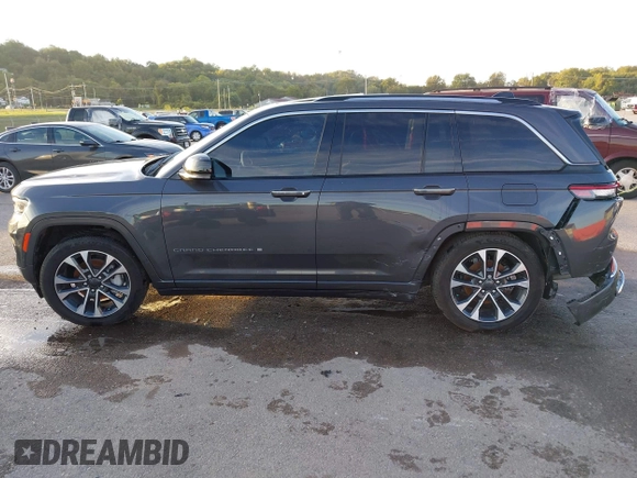 2023 Jeep Grand Cherokee Overland with VIN 1C4RJHDGXP8864365, listed as a IAAI auction lot 40502141 with 3,911 mi miles and . Bid and sale history available at DreamBid. Image 14.
