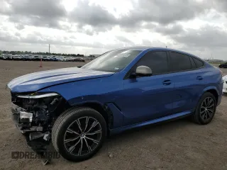 2020 BMW X6 M50i z VIN 5UXCY8C05L9B18644, wystawiony jako Copart lot #53895235 z przebiegiem 41 458 mil mil oraz Szkoda całkowita • Salvage title. Historia ofert i sprzedaży dostępna na DreamBid. Obrazek 1.