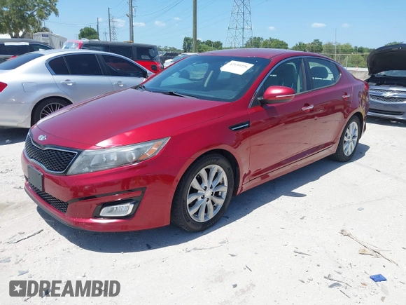 2014 Kia Optima LX with VIN 5XXGM4A75EG329546, listed as a IAAI auction lot 42159226 with 200,963 mi miles. Bid and sale history available at carsss.com. Image 2.