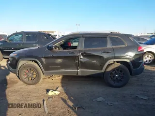 2015 Jeep Cherokee Latitude with VIN 1C4PJMCS0FW745949, listed as a IAAI auction lot 41289847 with 137,440 mi miles and . Bid and sale history available at carsss.com. Image 14.