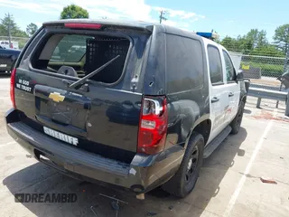 2013 Chevrolet Tahoe Commercial z VIN 1GNLC2E00DR337995, wystawiony jako IAAI lot #42213635 z przebiegiem Nie podano mil oraz . Historia ofert i sprzedaży dostępna na DreamBid. Obrazek 4.