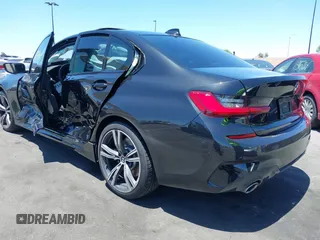 2020 BMW 3 Series 330i с VIN 3MW5R1J00L8B27239, выставлен на аукционе IAAI как лот 42269346 с пробегом 55 822 миль миль и . История ставок и продаж доступна на DreamBid. Изображение 3.