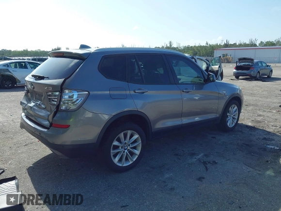 2015 BMW X3 xDrive28i with VIN 5UXWX9C50F0D53883, listed as a IAAI auction lot 42005760 with 127,339 mi miles and . Bid and sale history available at DreamBid. Image 4.