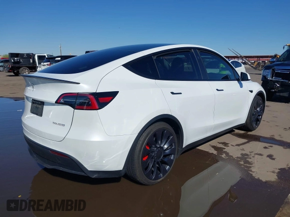 2024 Tesla Model Y Performance with VIN 7SAYGDEF4RF053711, listed as a IAAI auction lot 41836931 with 12,442 mi miles and . Bid and sale history available at DreamBid. Image 4.
