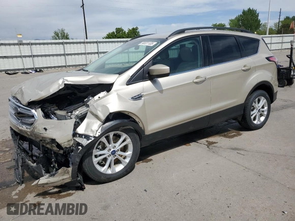 2018 Ford Escape SE z VIN 1FMCU9GD5JUC08024, wystawiony jako Copart lot #56531105 z przebiegiem 54 104 mil mil oraz Szkoda całkowita • Salvage title. Historia ofert i sprzedaży dostępna na DreamBid. Obrazek 1.
