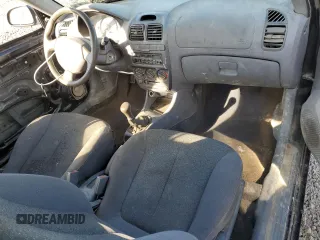 2002 Hyundai Accent z VIN KMHCF35G22U174792, wystawiony jako Copart lot #47281545 z przebiegiem 273 228 mil mil oraz Szkoda całkowita • Salvage title. Historia ofert i sprzedaży dostępna na DreamBid. Obrazek 8.