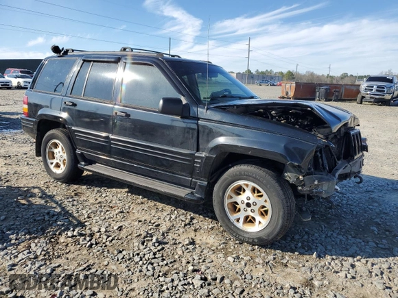 1997 Jeep Grand Cherokee Limited with VIN 1J4GZ78Y1VC598820, listed as a Copart auction lot 46398505 with 259,241 mi miles and Salvage Title. Bid and sale history available at carsss.com. Image 4.