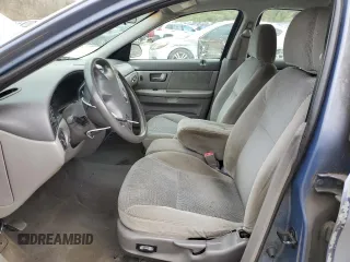 2000 Ford Taurus SE z VIN 1FAFP53U5YA259273, wystawiony jako Copart lot #52787305 z przebiegiem 234 848 mil mil oraz Szkoda całkowita • Salvage title. Historia ofert i sprzedaży dostępna na DreamBid. Obrazek 7.