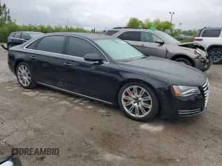 2013 Audi A8 3.0L with VIN WAURGAFD2DN013552, listed as a Copart auction lot 57822075 with 146,315 mi miles and Salvage title. Bid and sale history available at DreamBid. Image 4.