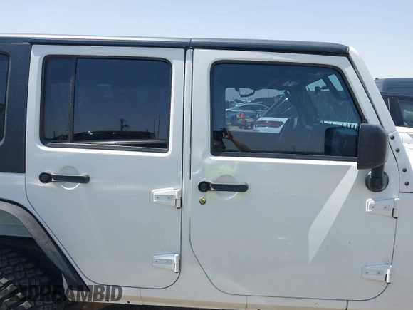 2013 Jeep Wrangler Unlimited Sport with VIN 1C4BJWDGXDL694054, listed as a IAAI auction lot 42097708 with 130,360 mi miles and . Bid and sale history available at DreamBid. Image 14.
