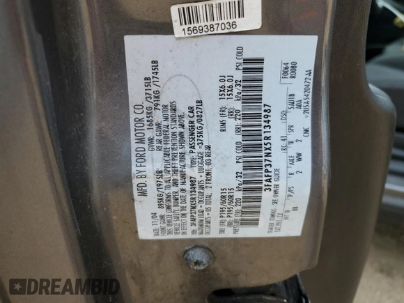 2005 Ford Focus S with VIN 3FAFP37NX5R134987, listed as a Copart auction lot 60478825 with 204,927 mi miles and Clean title. Bid and sale history available at DreamBid. Image 12.