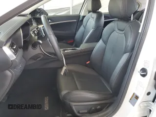 2023 Genesis G70 2.0T with VIN KMTG34TA0PU131807, listed as a Copart auction lot 66194774 with 12,185 mi miles and Salvage Title. Bid and sale history available at DreamBid. Image 7.