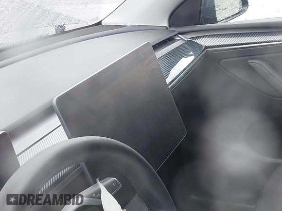 2023 Tesla Model Y Performance with VIN 7SAYGDEF0PF774282, listed as a IAAI auction lot 41807031 with Not Provided miles and . Bid and sale history available at DreamBid. Image 14.