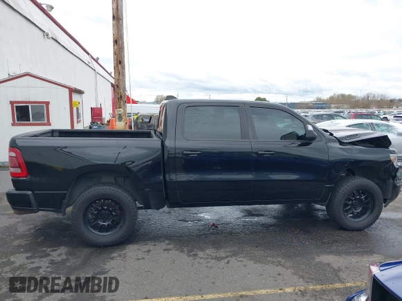 2019 Ram 1500 Big Horn/Lone Star with VIN 1C6SRFFT9KN625013, listed as a IAAI auction lot 41611276 with 100,463 mi miles. Bid and sale history available at carsss.com. Image 14.