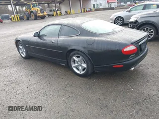 1997 Jaguar XK with VIN SAJGX5741VC004596, listed as a IAAI auction lot 41588751 with 188,607 mi miles and . Bid and sale history available at DreamBid. Image 3.