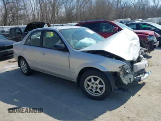 2000 Mazda Protege DX with VIN JM1BJ2227Y0240819, listed as a IAAI auction lot 41810228 with 68,650 mi miles and . Bid and sale history available at DreamBid. Image 1.