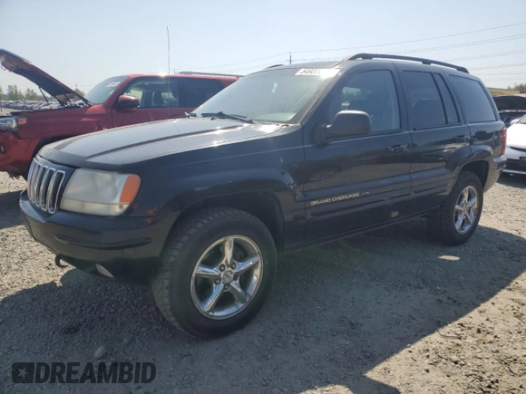 2002 Jeep Grand Cherokee Limited with VIN 1J8GW58NX2C158544, listed as a Copart auction lot 54937665 with 259,089 mi miles and Salvage title. Bid and sale history available at DreamBid. Image 1.