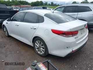 2018 Kia Optima S with VIN 5XXGT4L36JG265878, listed as a IAAI auction lot 42302801 with 101,927 mi miles and . Bid and sale history available at DreamBid. Image 3.