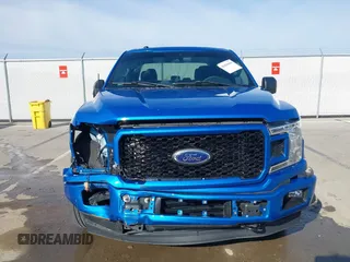 2019 Ford F-150 XL with VIN 1FTEW1EP0KKF24515, listed as a IAAI auction lot 41810694 with 58,906 mi miles. Bid and sale history available at carsss.com. Image 6.
