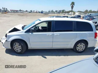 2016 Dodge Grand Caravan SE with VIN 2C4RDGBG2GR311654, listed as a IAAI auction lot 42056032 with 185,330 mi miles and . Bid and sale history available at DreamBid. Image 14.
