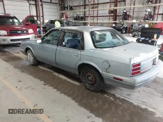 1994 Oldsmobile Cutlass Ciera S z VIN 1G3AG55M1R6384518, wystawiony jako IAAI lot #41714821 z przebiegiem 108 397 mil mil oraz . Historia ofert i sprzedaży dostępna na DreamBid. Obrazek 3.