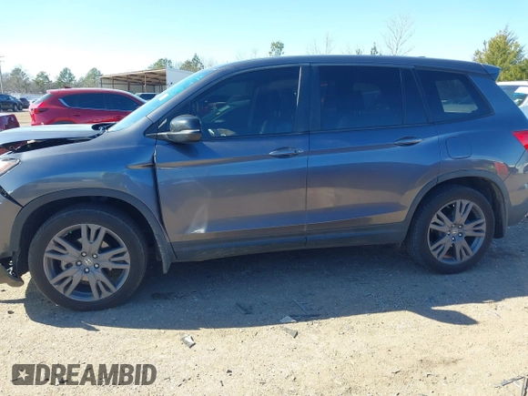 2019 Honda Passport EX-L with VIN 5FNYF7H54KB000467, listed as a IAAI auction lot 41342341 with 172,811 mi miles and . Bid and sale history available at carsss.com. Image 14.