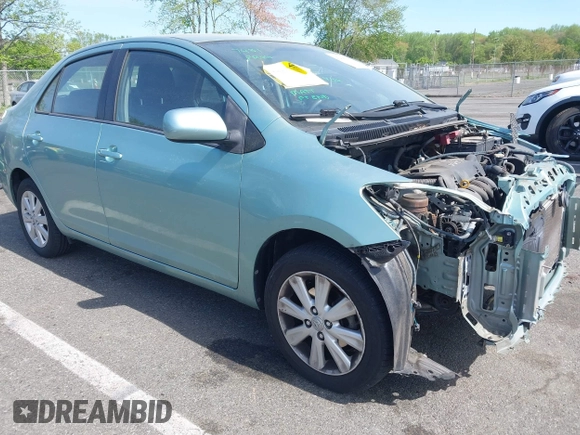 2009 Toyota Yaris z VIN JTDBT903091303947, wystawiony jako IAAI lot #42155269 z przebiegiem 64 484 mil mil oraz . Historia ofert i sprzedaży dostępna na DreamBid. Obrazek 1.