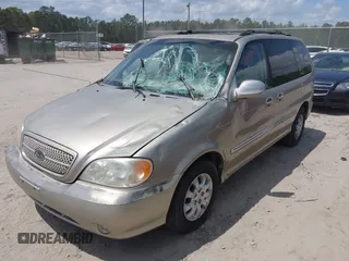 2005 Kia Sedona LX with VIN KNDUP131756627998, listed as a IAAI auction lot 42058213 with 152,433 mi miles. Bid and sale history available at carsss.com. Image 2.