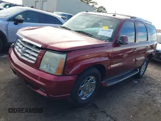 2003 Cadillac Escalade z VIN 1GYEC63T53R146068, wystawiony jako IAAI lot #41634405 z przebiegiem 272 263 mil mil oraz . Historia ofert i sprzedaży dostępna na DreamBid. Obrazek 17.
