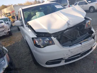 2015 Chrysler Town & Country S with VIN 2C4RC1HG7FR742447, listed as a IAAI auction lot 41814403 with 171,766 mi miles. Bid and sale history available at carsss.com. Image 1.