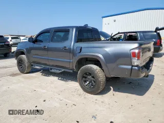 2021 Toyota Tacoma SR with VIN 3TMCZ5AN9MM451389, listed as a Copart auction lot 59191355 with 26,427 mi miles and Salvage title. Bid and sale history available at DreamBid. Image 2.