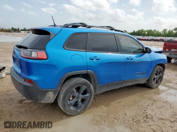 2021 Jeep Cherokee Altitude with VIN 1C4PJLLB0MD215189, listed as a Copart auction lot 61094535 with 88,449 mi miles and Salvage title. Bid and sale history available at DreamBid. Image 3.