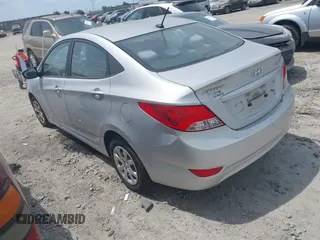 2013 Hyundai Accent GLS with VIN KMHCT4AE3DU403616, listed as a IAAI auction lot 42095208 with 128,523 mi miles. Bid and sale history available at carsss.com. Image 3.